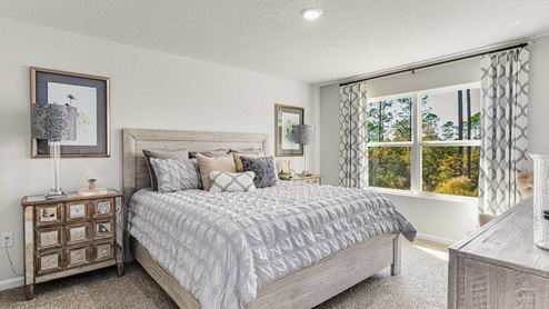 The Cali floorplan primary bedroom with large window
