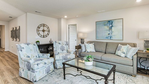 The Cali floorplan living room with EVP flooring throughout