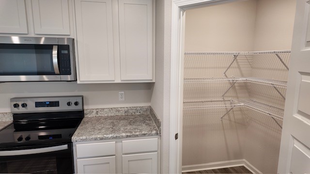 The Lakeside floorplan kitchen pantry with wire shelving
