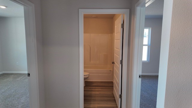 The Lakeside floorplan guest bedroom one and two hallway