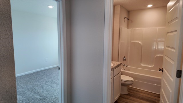 The Lakeside floorplan guest bedroom three and four hallway