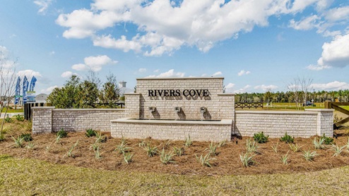 Rivers Cove community entrance sign with water feature