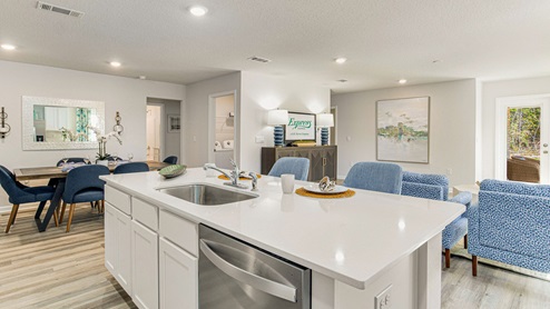 The Highlands Lakeside Model Home kitchen with stainless steel appliances