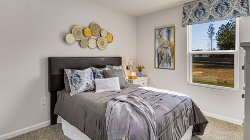The Highlands Lakeside Model Home guest bedroom four