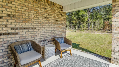 The Highlands Lakeside Model Home back porch