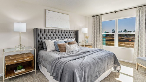 The Lakeside primary bedroom with luxury carpet
