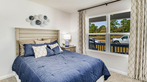 The Lakeside guest bedroom one