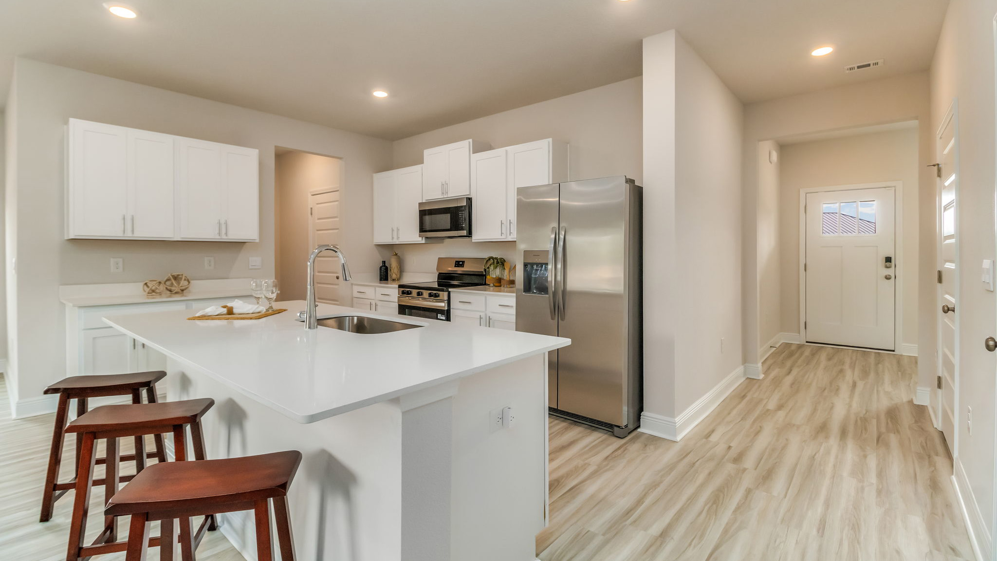 The Belfort floorplan kitchen island with quartz countertops