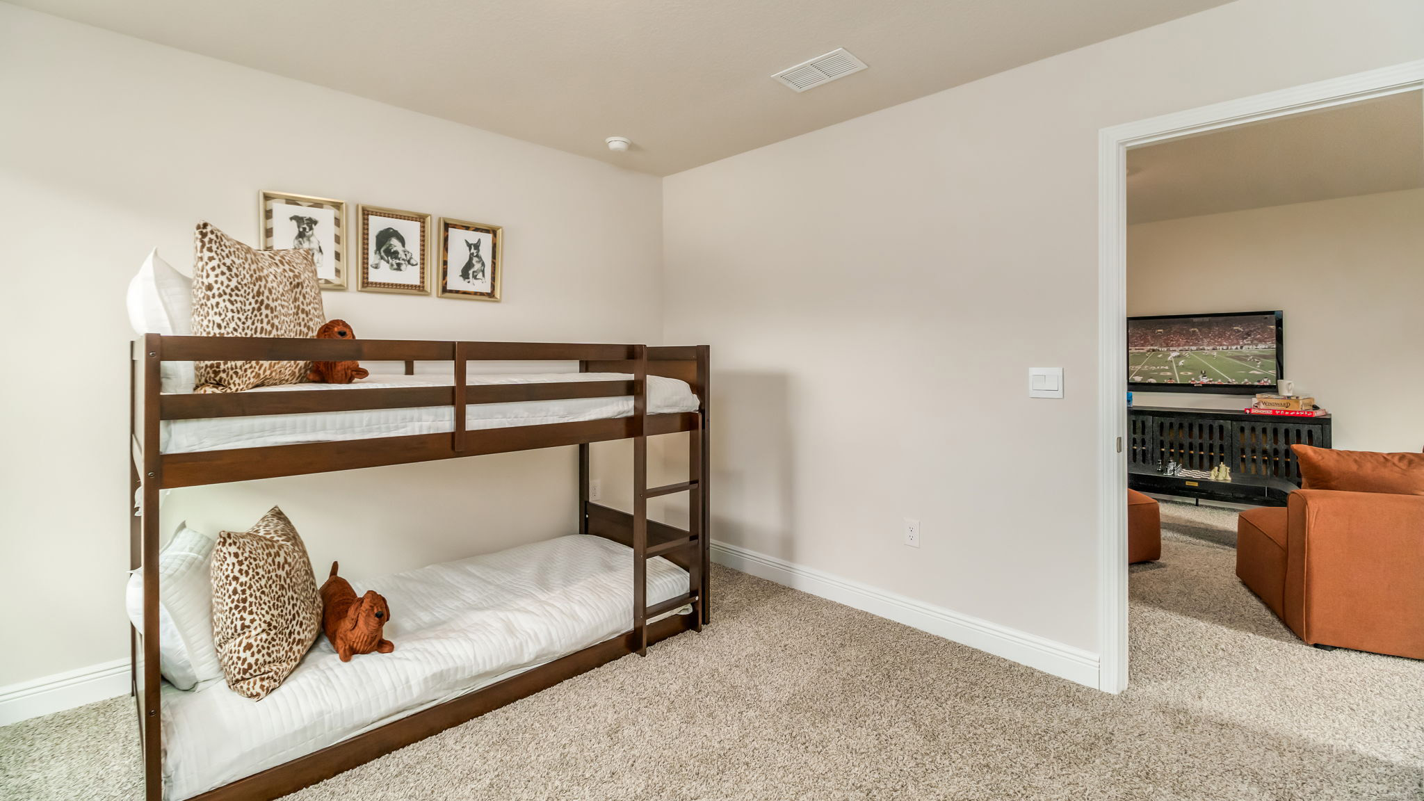 The Belfort floorplan guest bedroom three with one window and carpet throughout