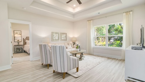 The Rhett living room with EVP flooring throughout