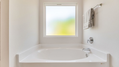 The Rhett primary bathroom with soaking tub