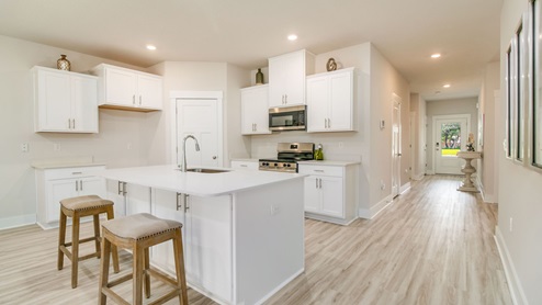 The Rhett kitchen with quartz countertops and kitchen island