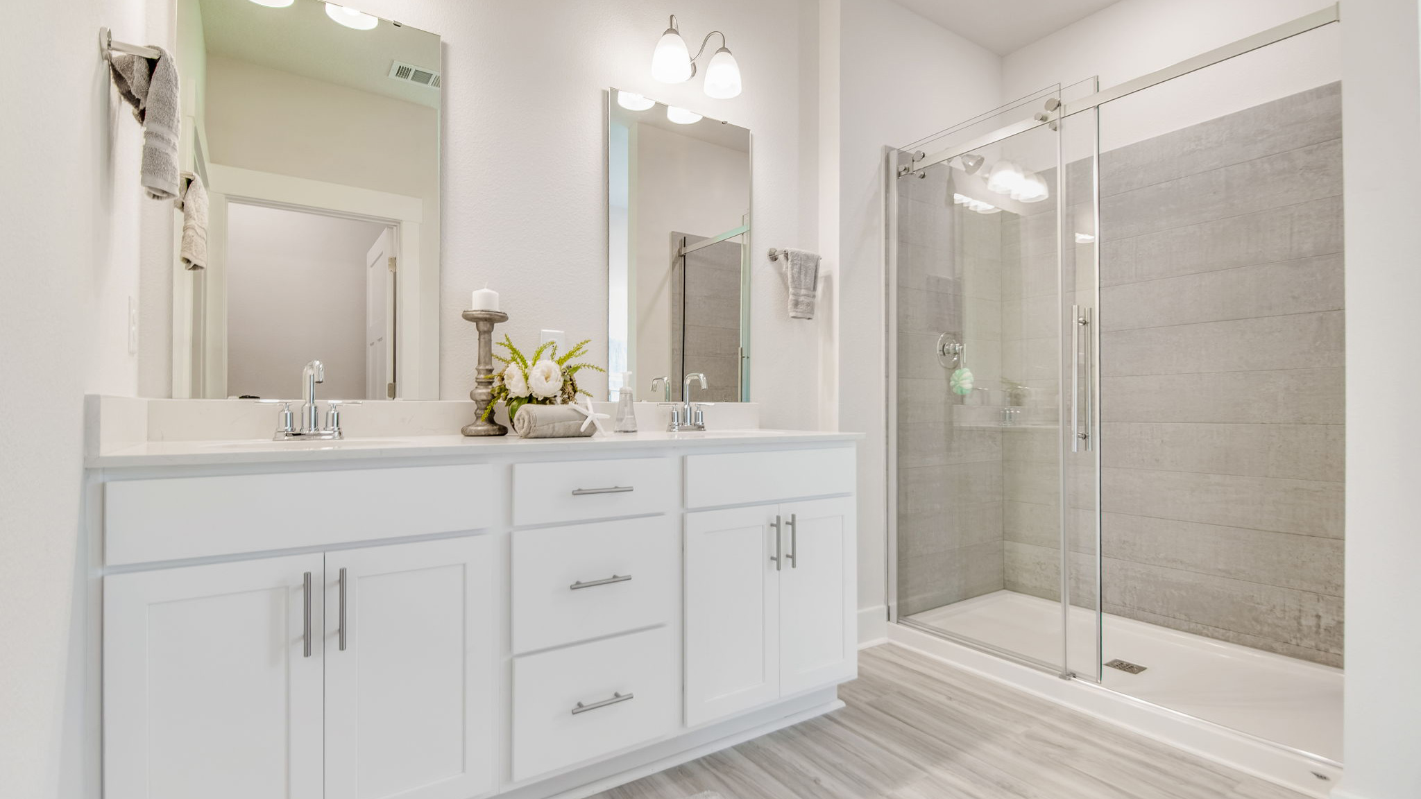 The Rhett floorplan primary bathroom with dual vanity and quartz countertops