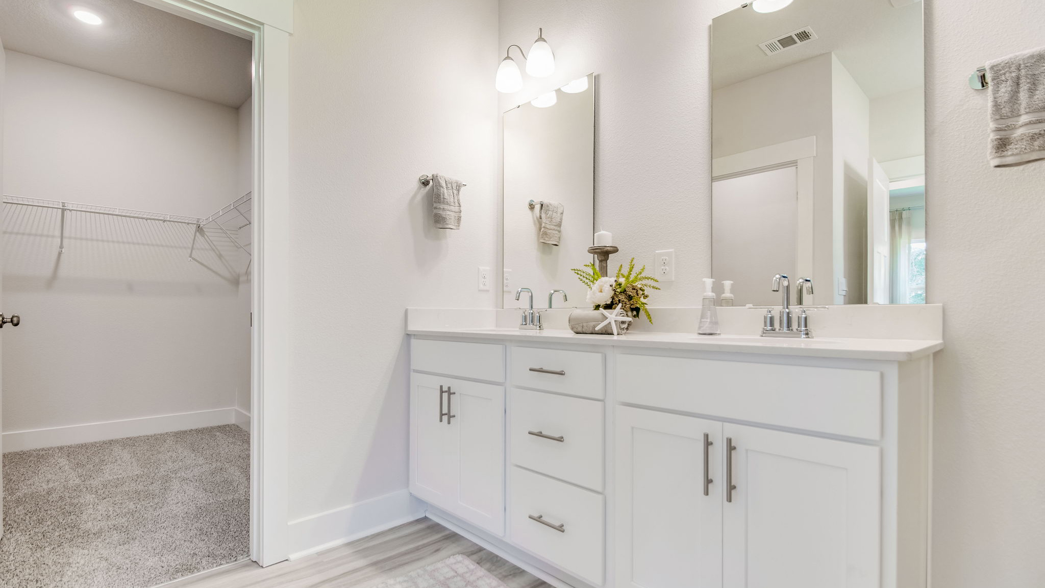 The Rhett floorplan primary bathroom with dual vanity and quartz countertops