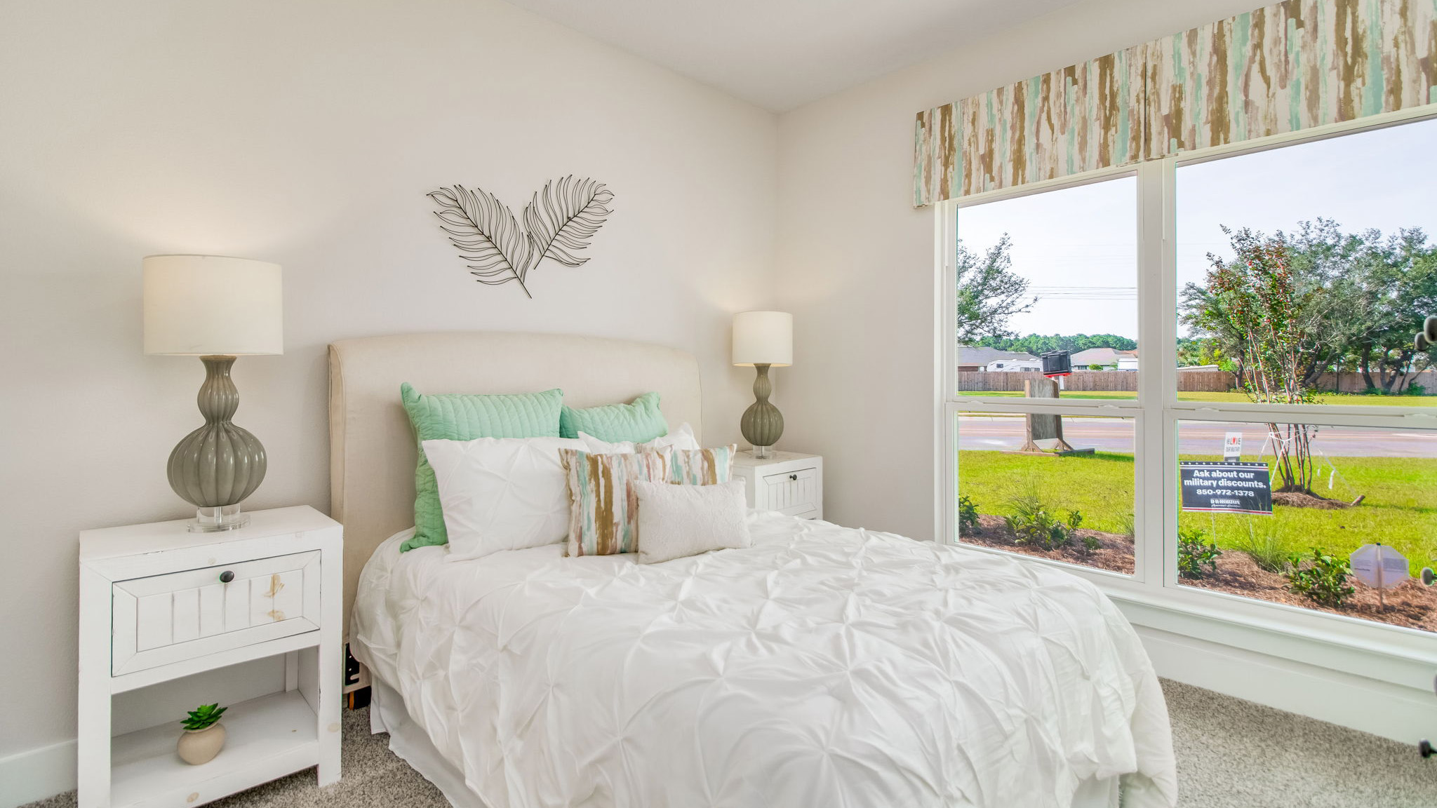 The Rhett floorplan guest bedroom two with carpet throughout