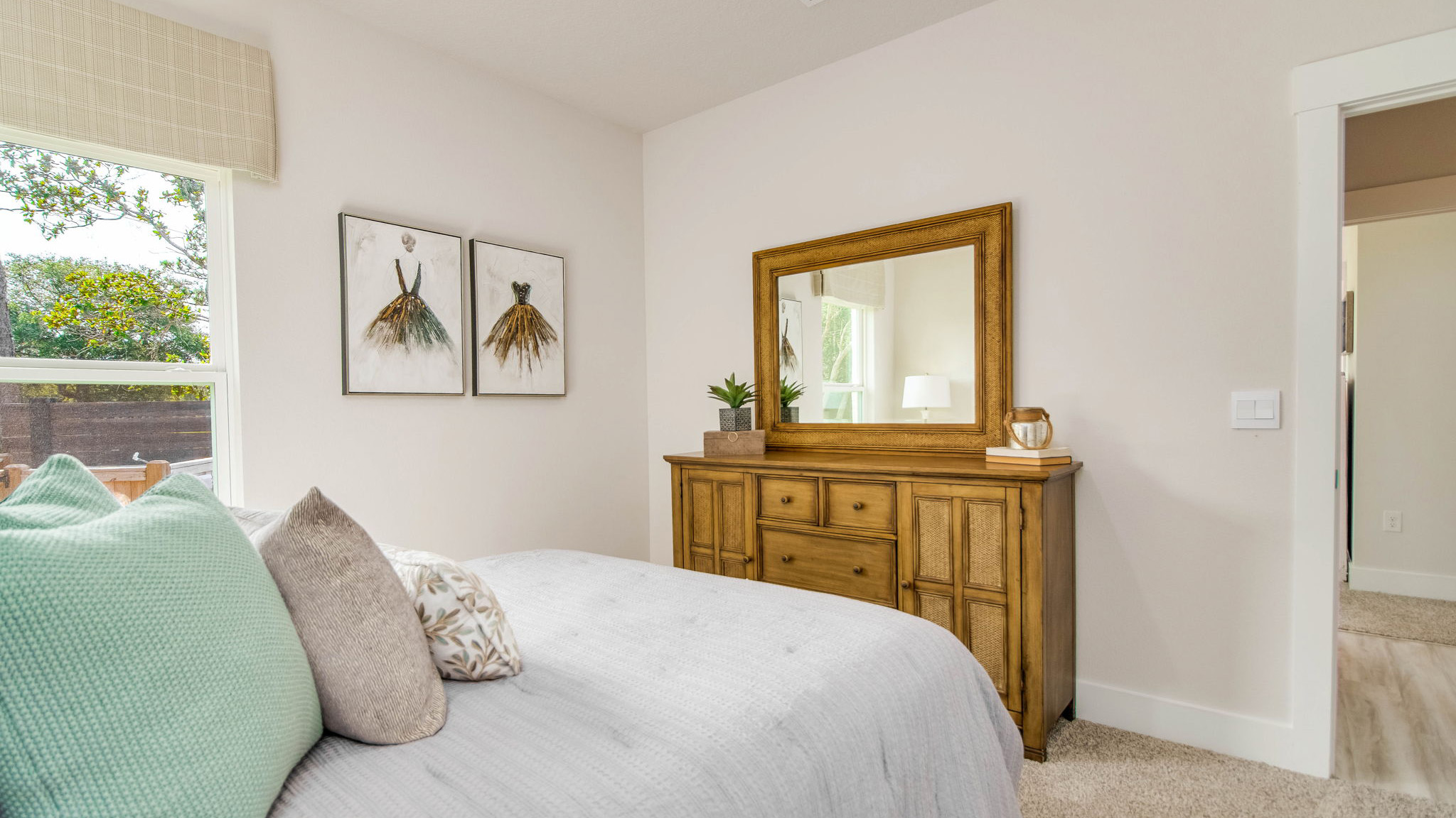 The Rhett floorplan guest bedroom three with carpet throughout