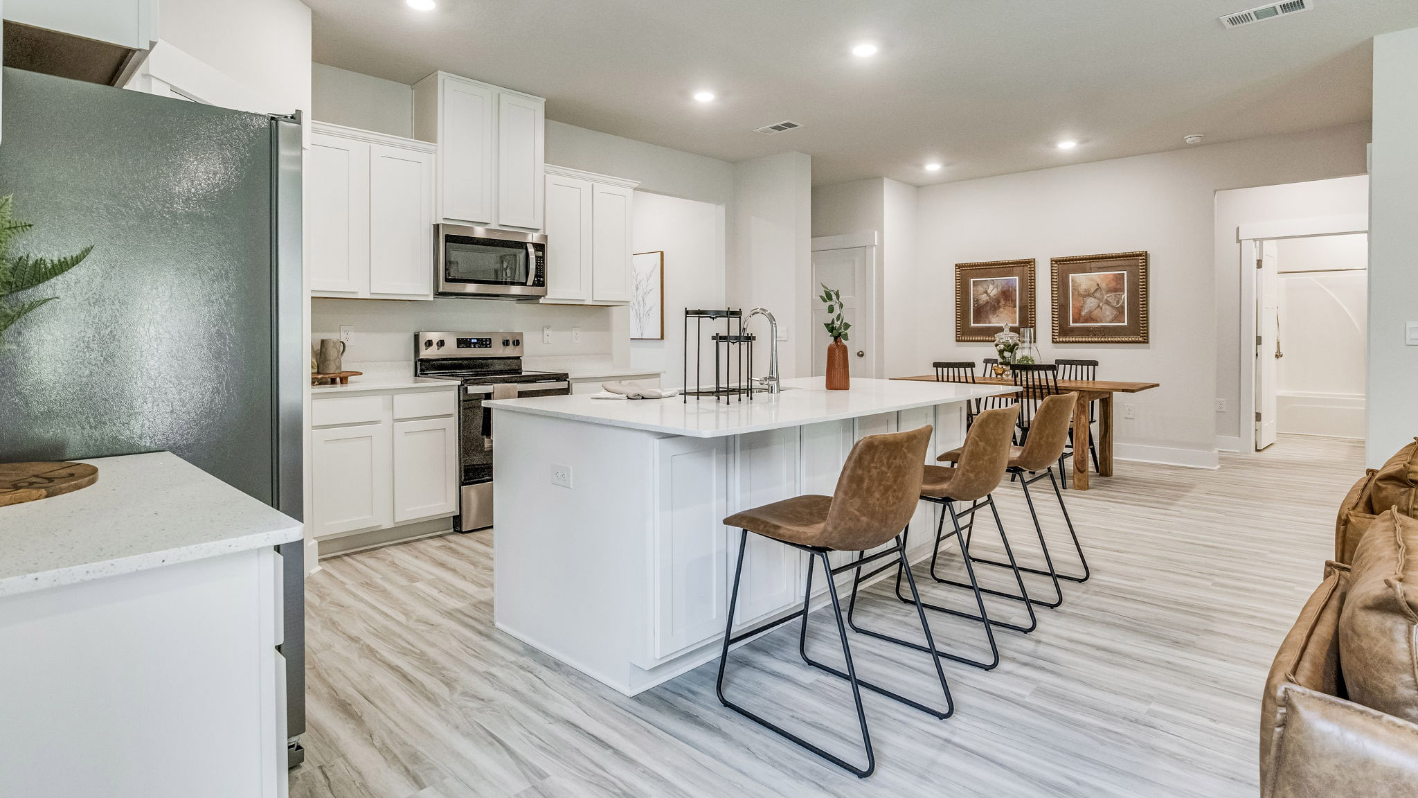 The Riverside floorplan kitchen island with quartz countertops