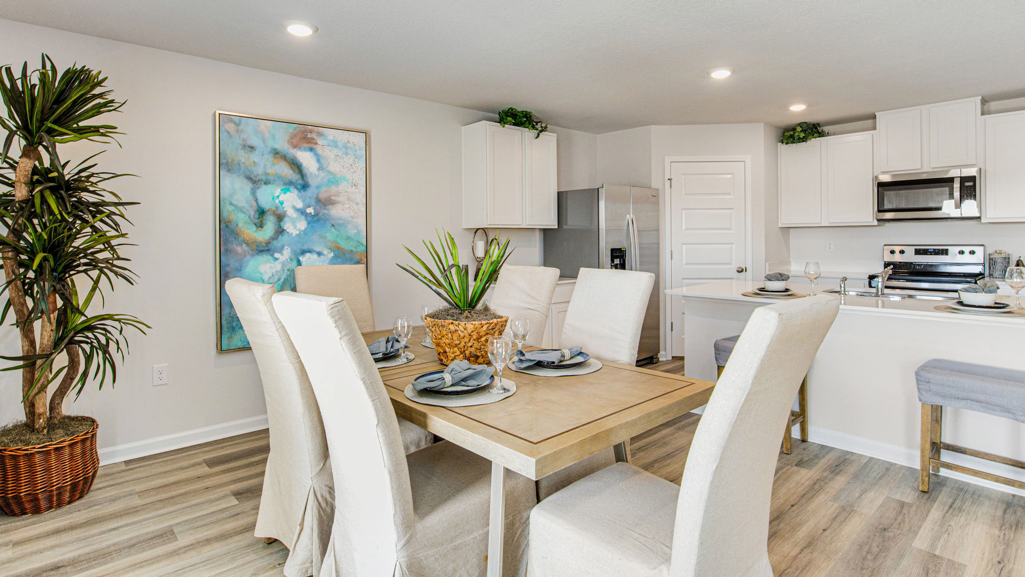 The Cali floorplan dining space with EVP flooring throughout
