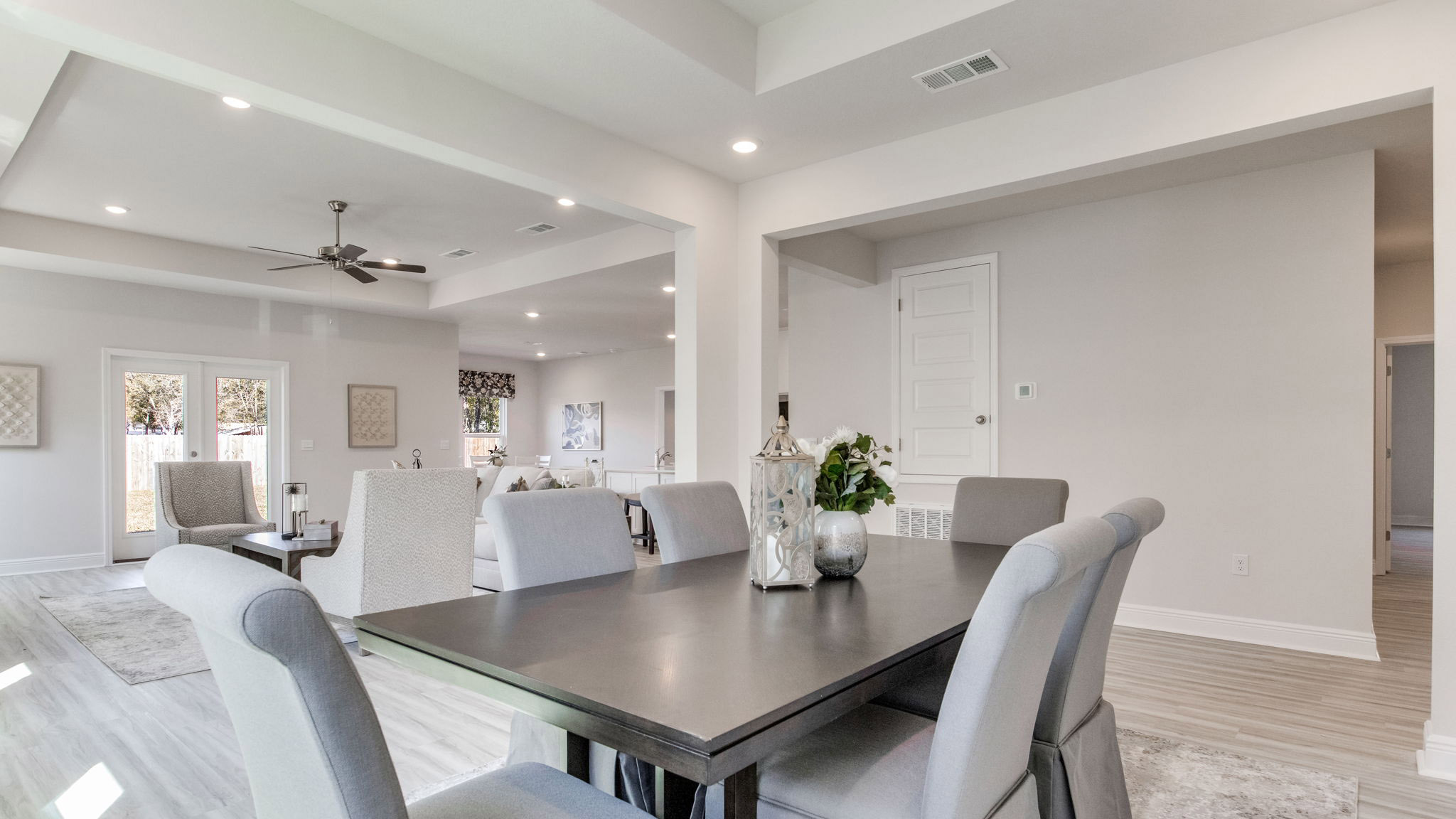 The Camden floorplan dining room with tray ceilings