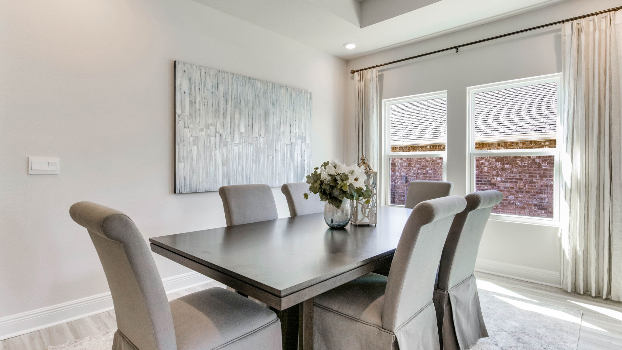 The Camden floorplan dining room with EVP flooring throughout