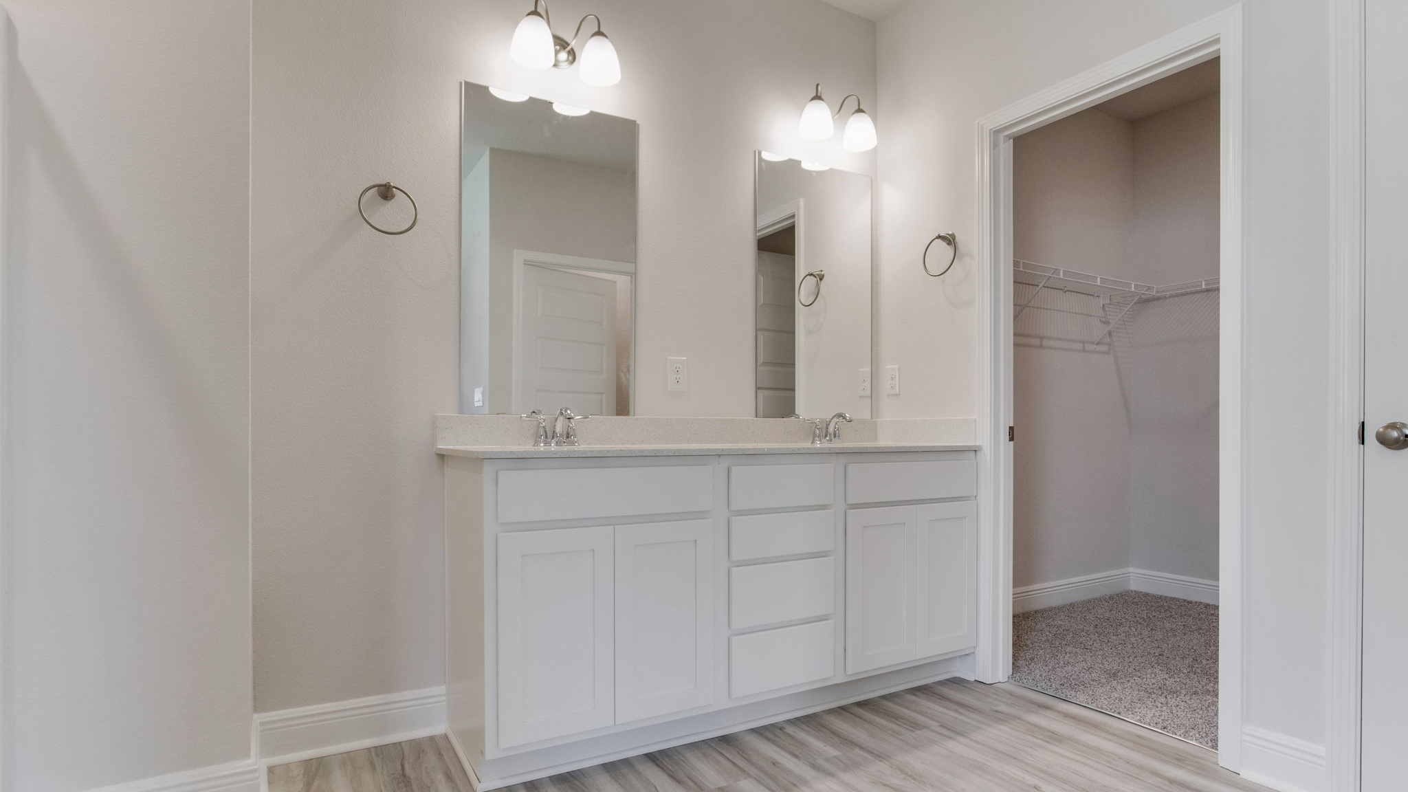 The Camden floorplan primary bathroom with dual vanity and quartz countertops