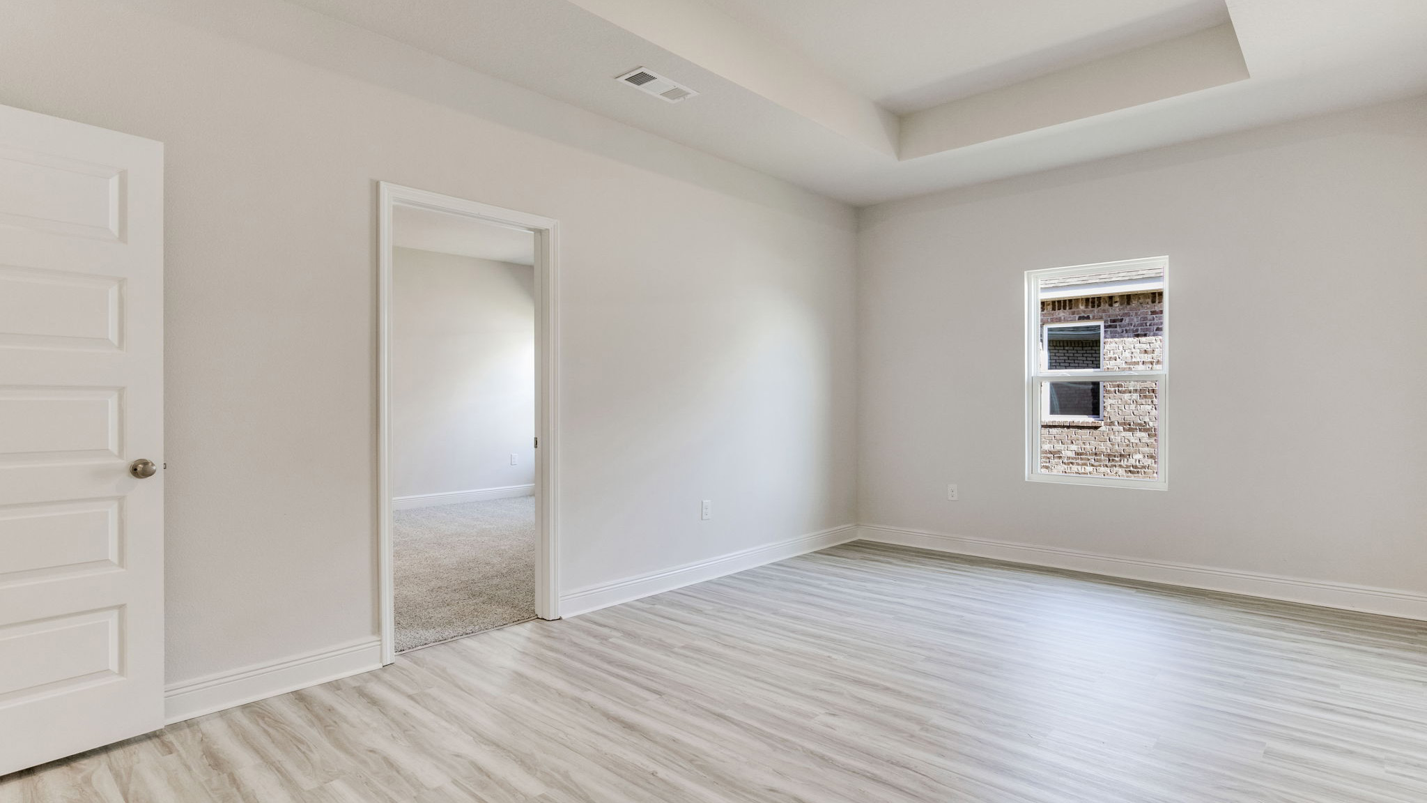 The Camden floorplan additional living space with trey ceilings