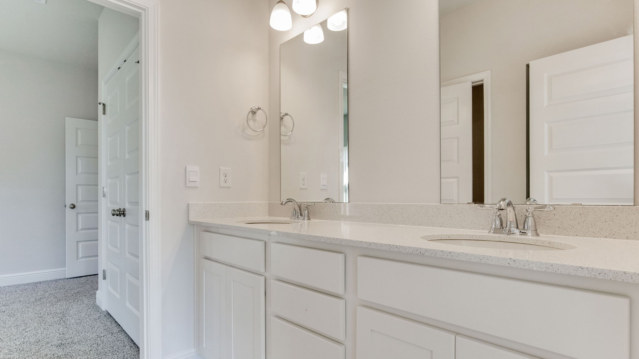 The Camden floorplan guest bathroom with dual vanity and separate shower/toilet room