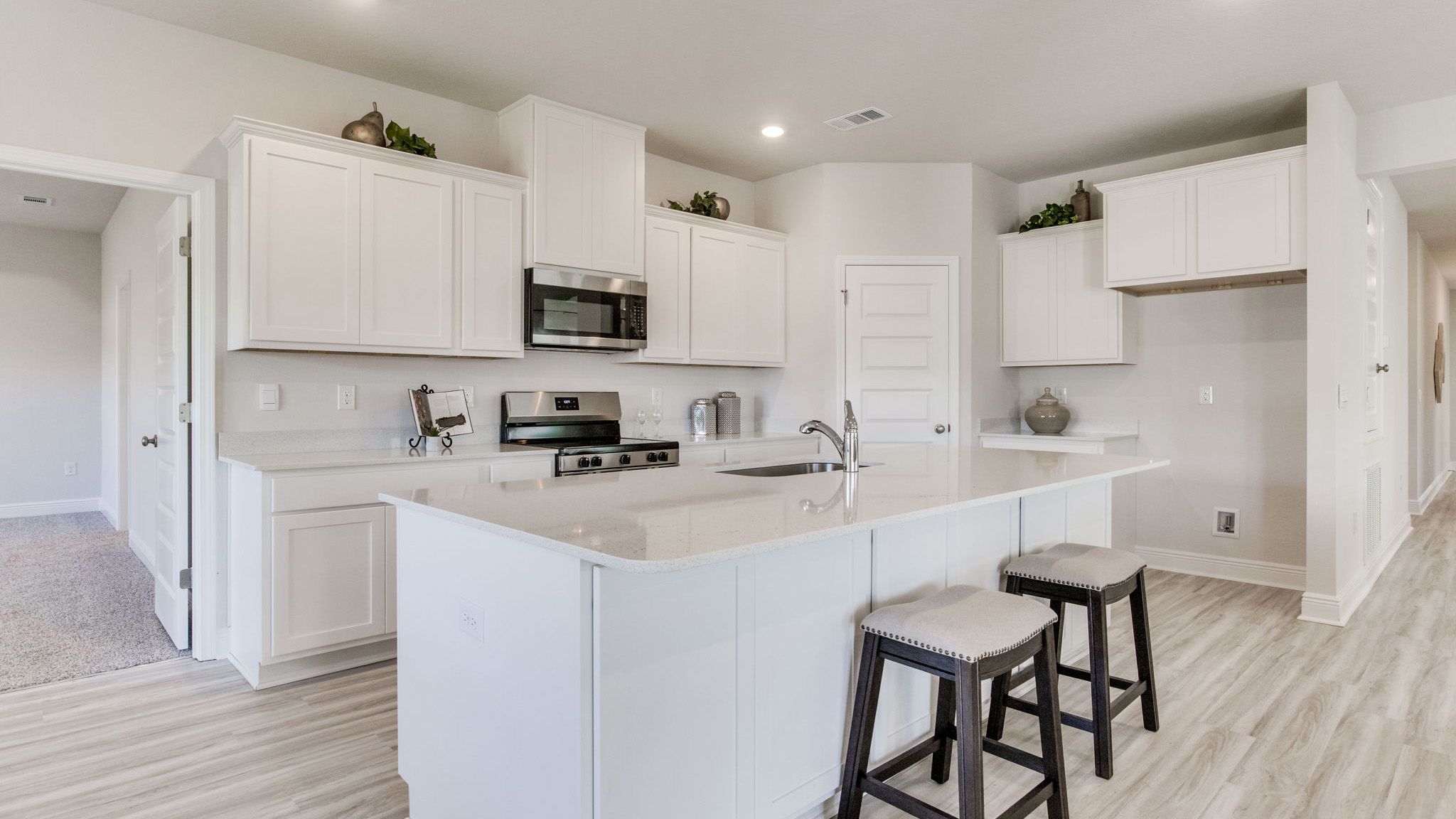 The Camden floorplan kitchen with quartz countertops