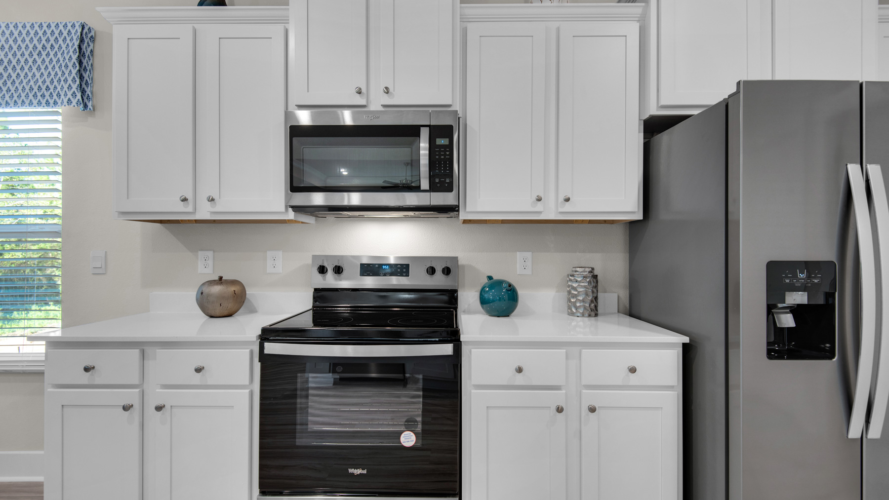 The Destin floorplan kitchen with stainless-steel appliances