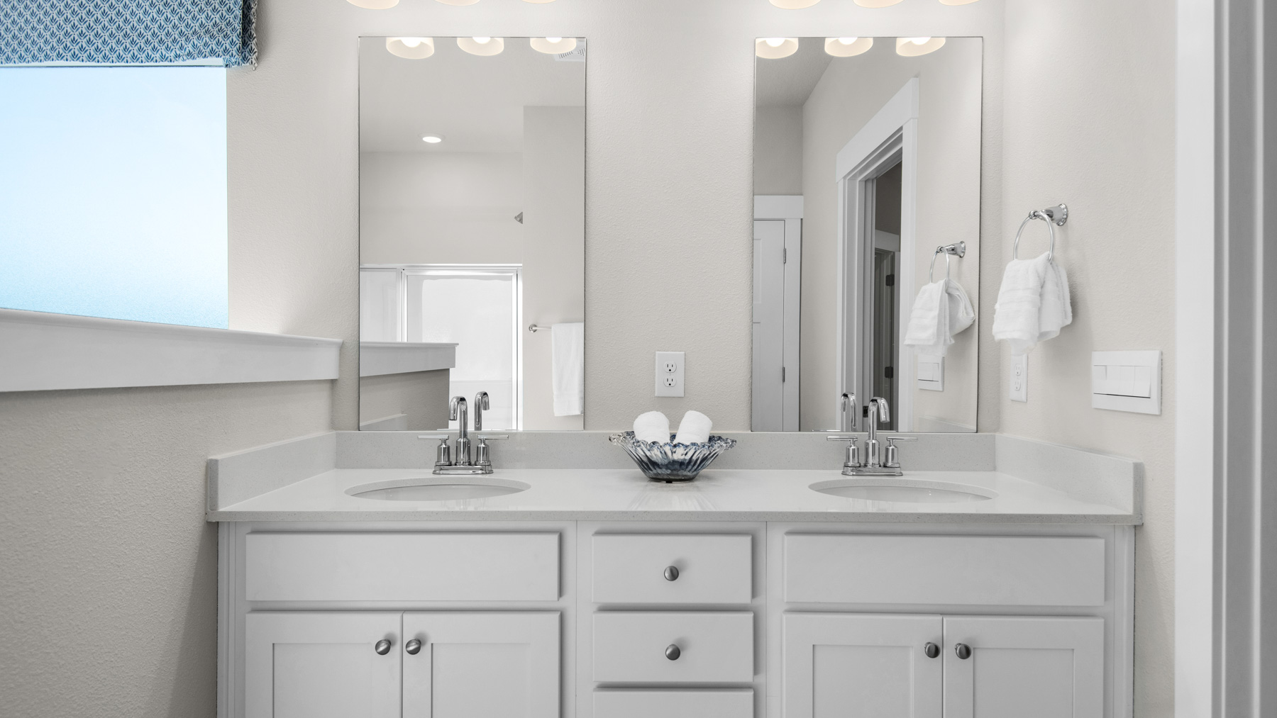 The Destin floorplan primary bathroom dual vanity with quartz countertops