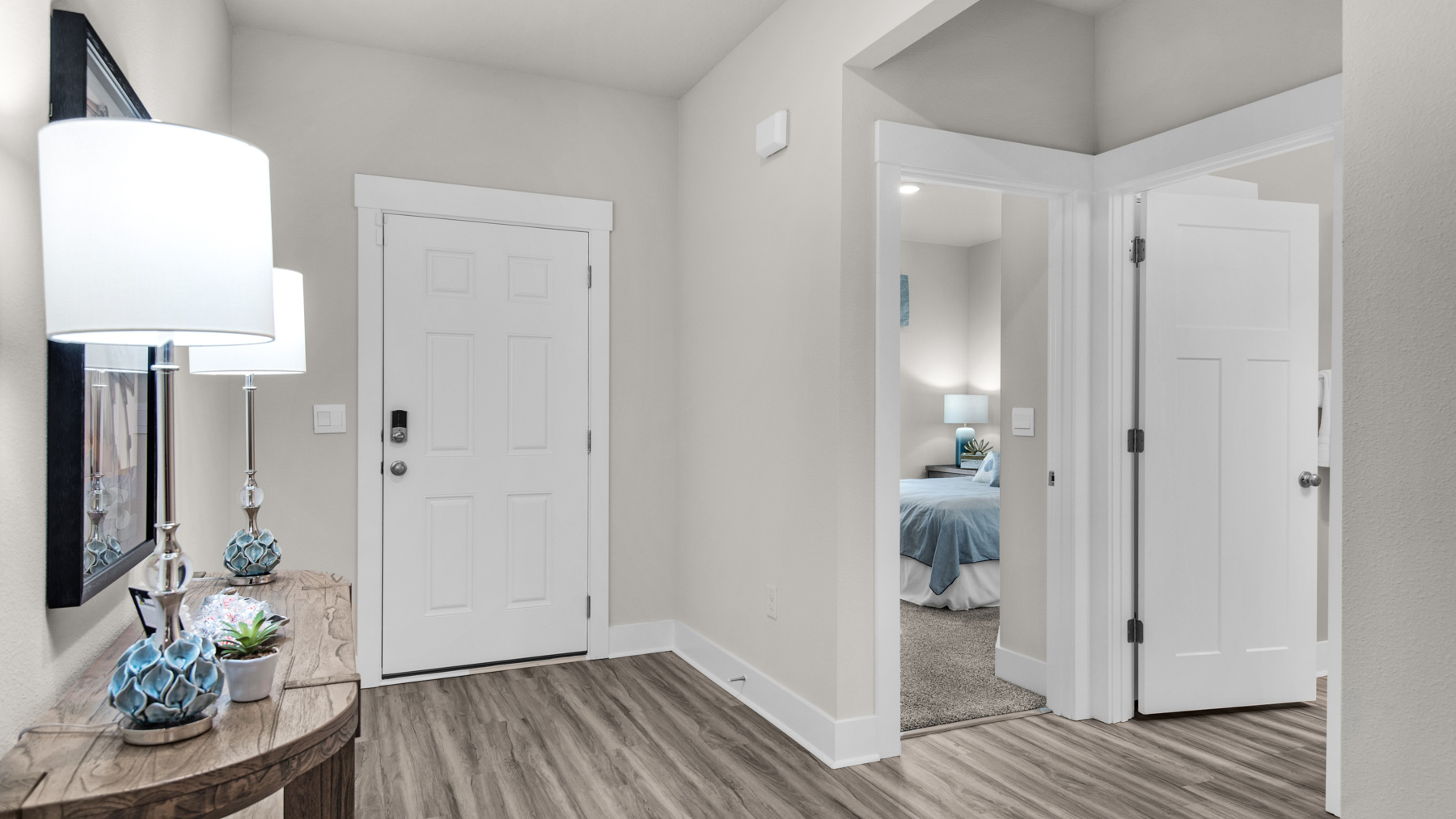 The Destin floorplan entry way with EVP flooring throughout