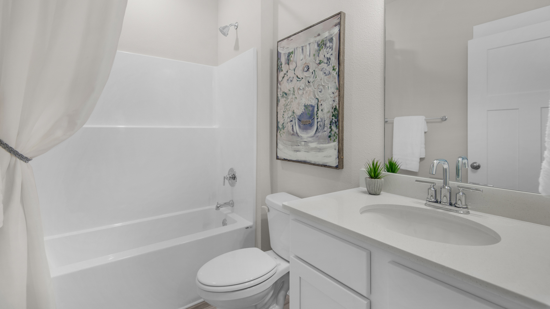 The Destin floorplan guest bathroom two with shower tub combo