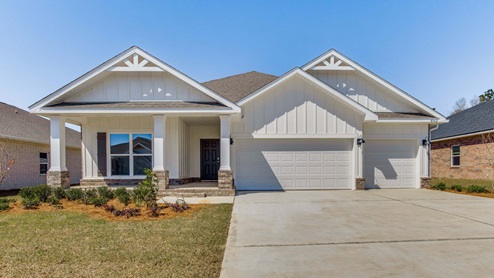 The Destin D5 at Plantation Woods with brick exterior