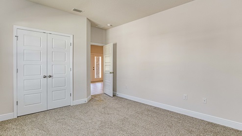 The McKenzie floorplan guest bedroom one