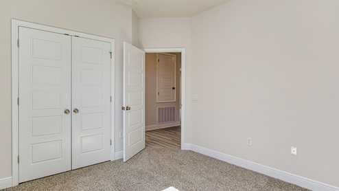 The McKenzie floorplan guest bedroom two