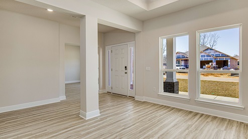The McKenzie floorplan entry with EVP flooring throughout