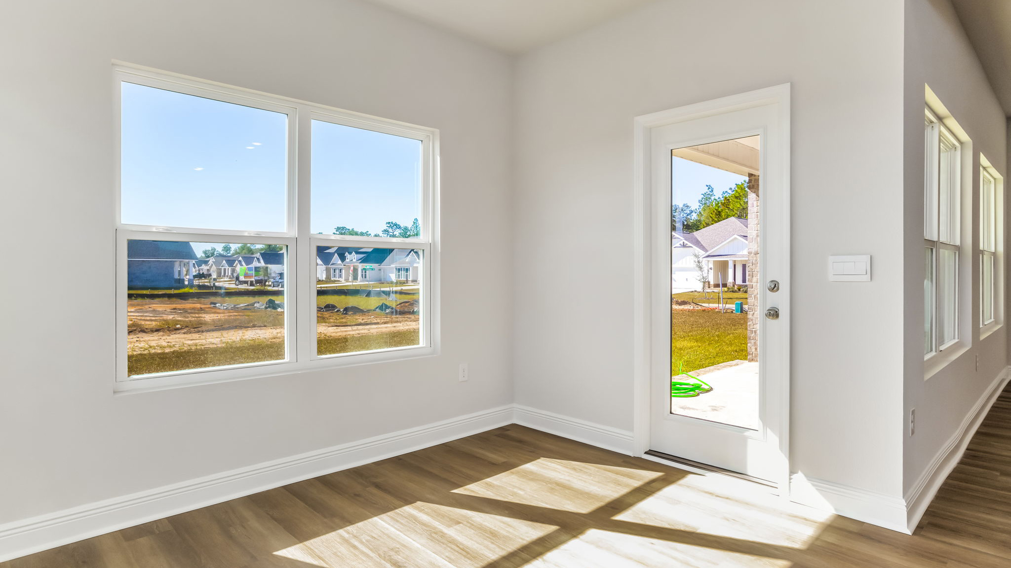 The Madison floorplan dining room and back porch door