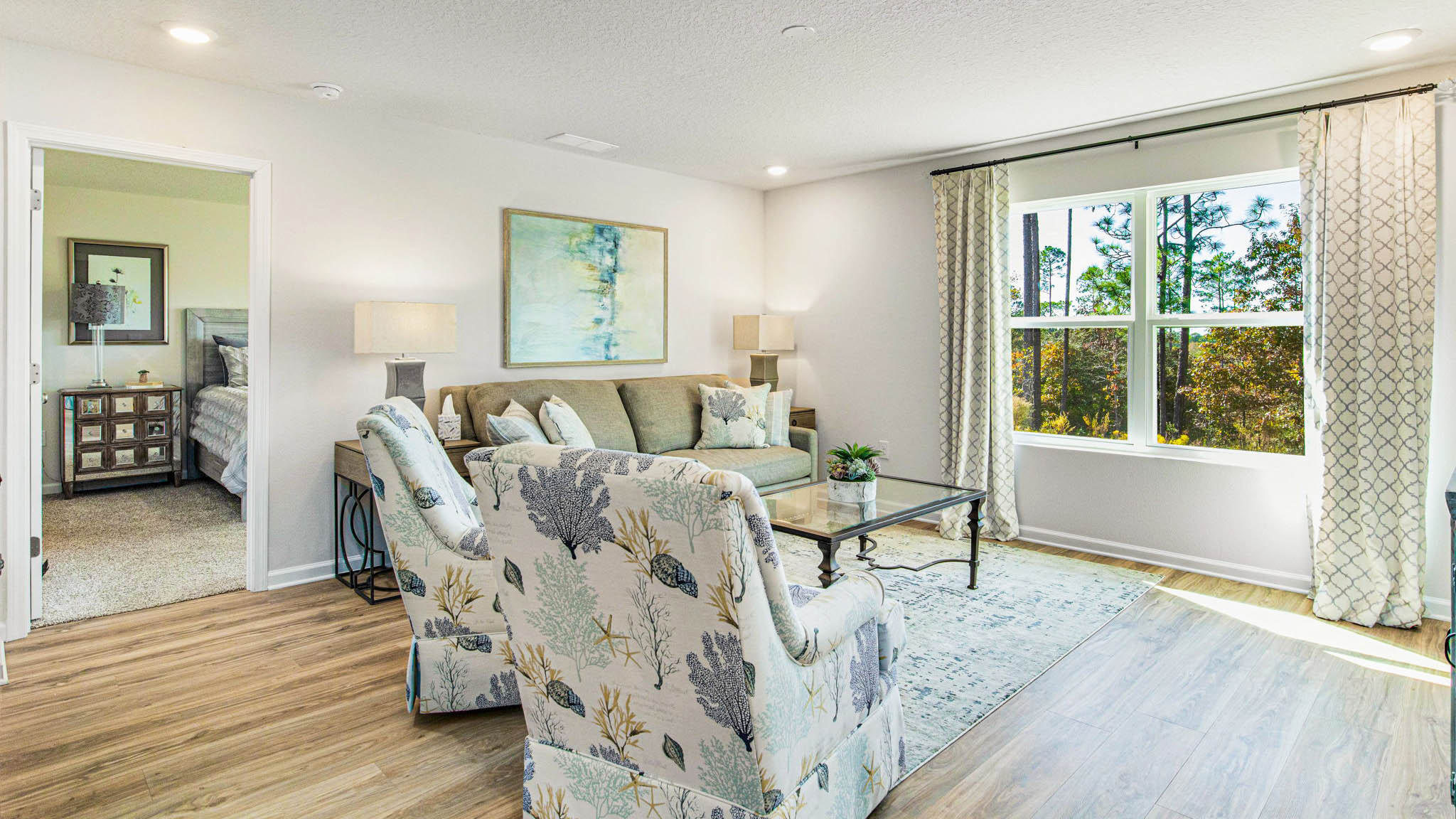 The Cali floorplan living room with EVP flooring throughout