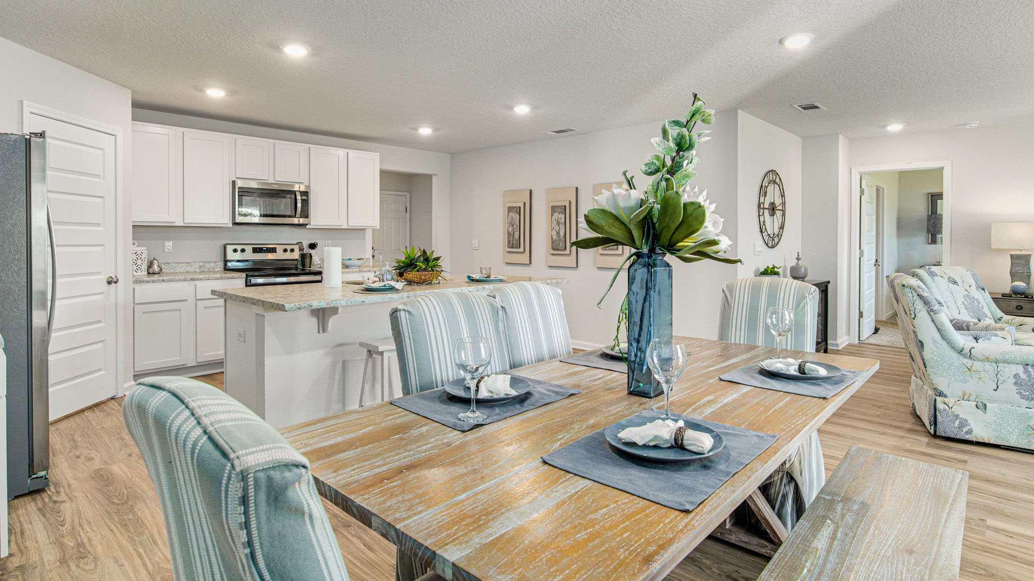 The Cali floorplan dining space with EVP flooring throughout