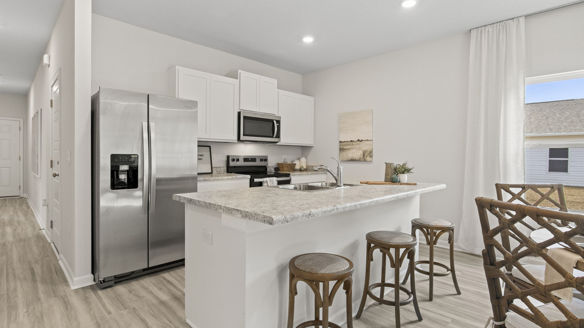 The Delilah floorplan kitchen island with Formica countertops