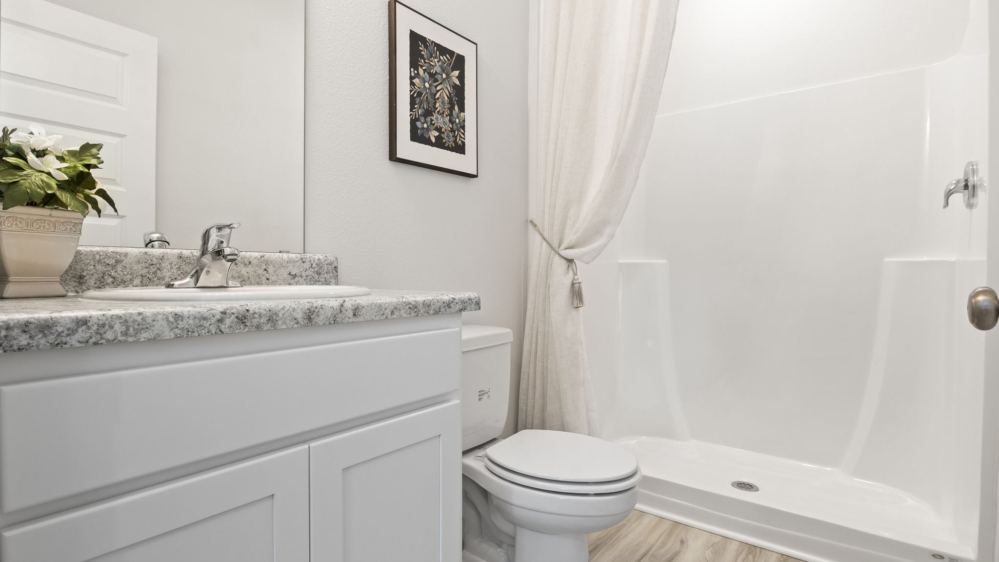 The Delilah floorplan primary bathroom with shower and single vanity