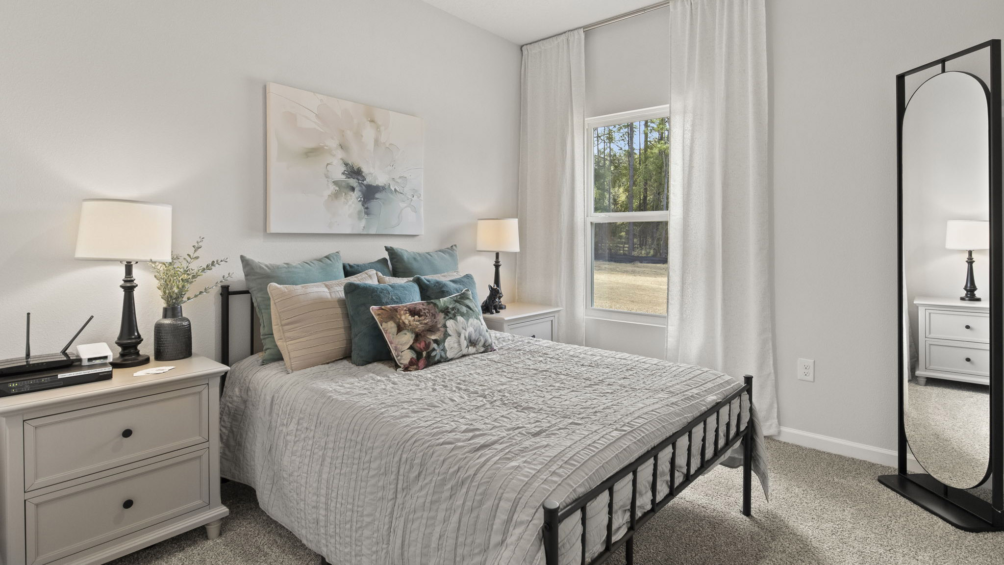 The Delilah floorplan guest bedroom one with window view