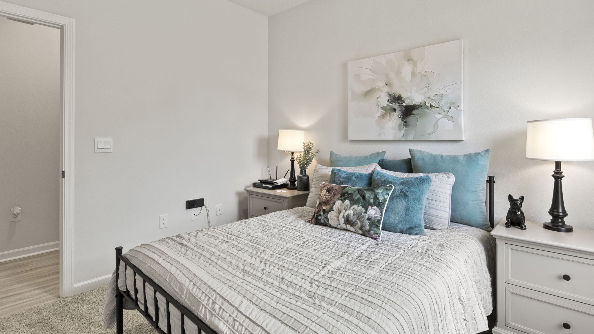 The Delilah floorplan guest bedroom one with carpet throughout