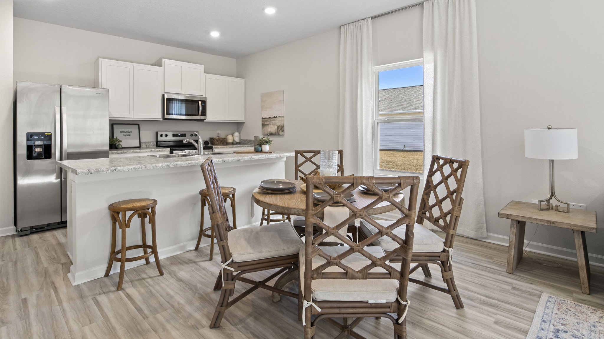 The Delilah floorplan open concept dining room and kitchen