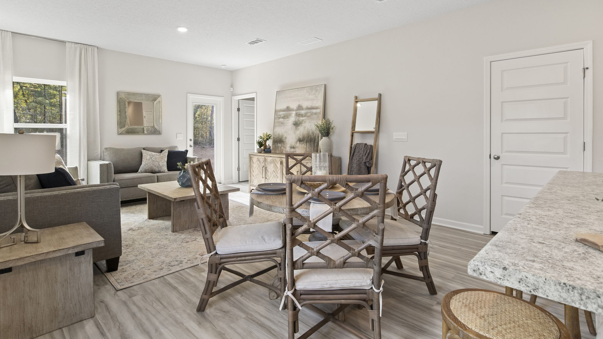 The Delilah floorplan dining room with EVP flooring throughout