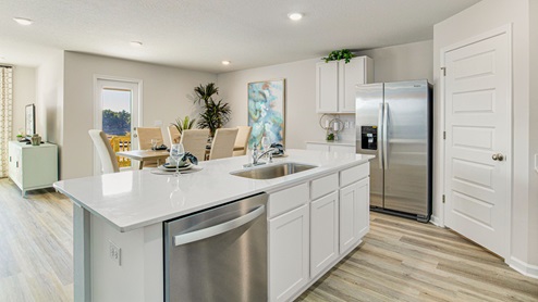The Cali kitchen overlooking the dining room