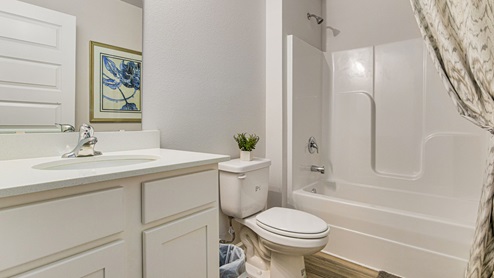 The Cali laundry room with LVP flooring