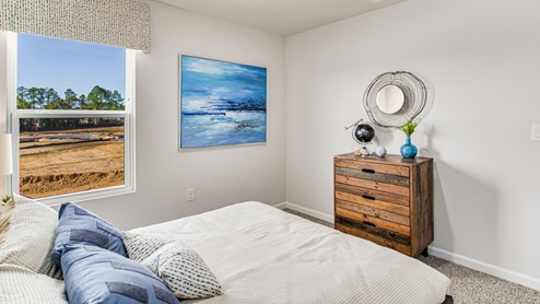 The Cali guest bedroom two with luxury carpet