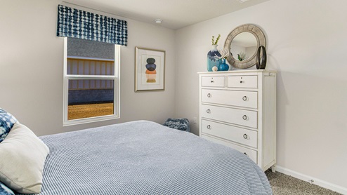 The Cali guest bedroom three with window