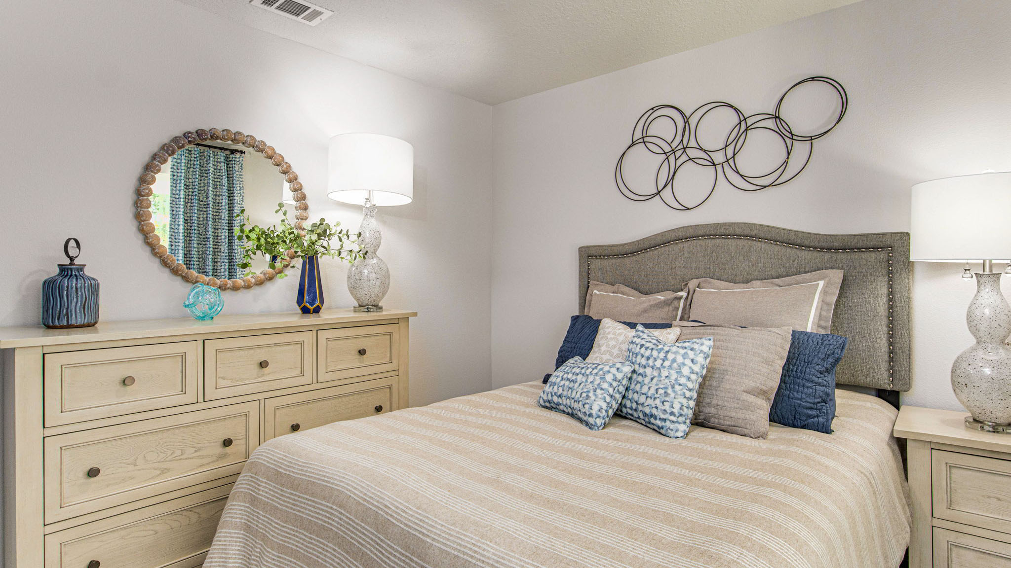 The Lakeside floorplan guest bedroom three with carpet throughout